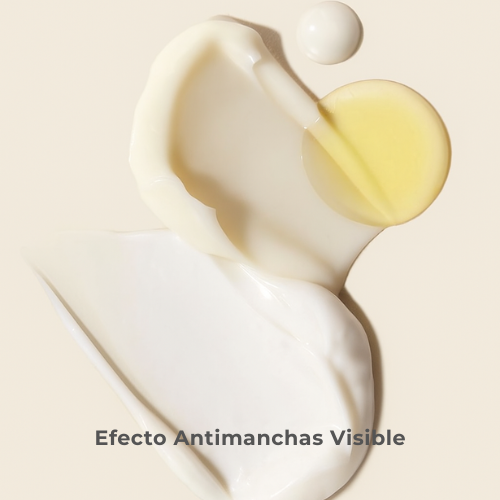 Close-up of a white container with a yellow liquid being poured into it on a beige background.